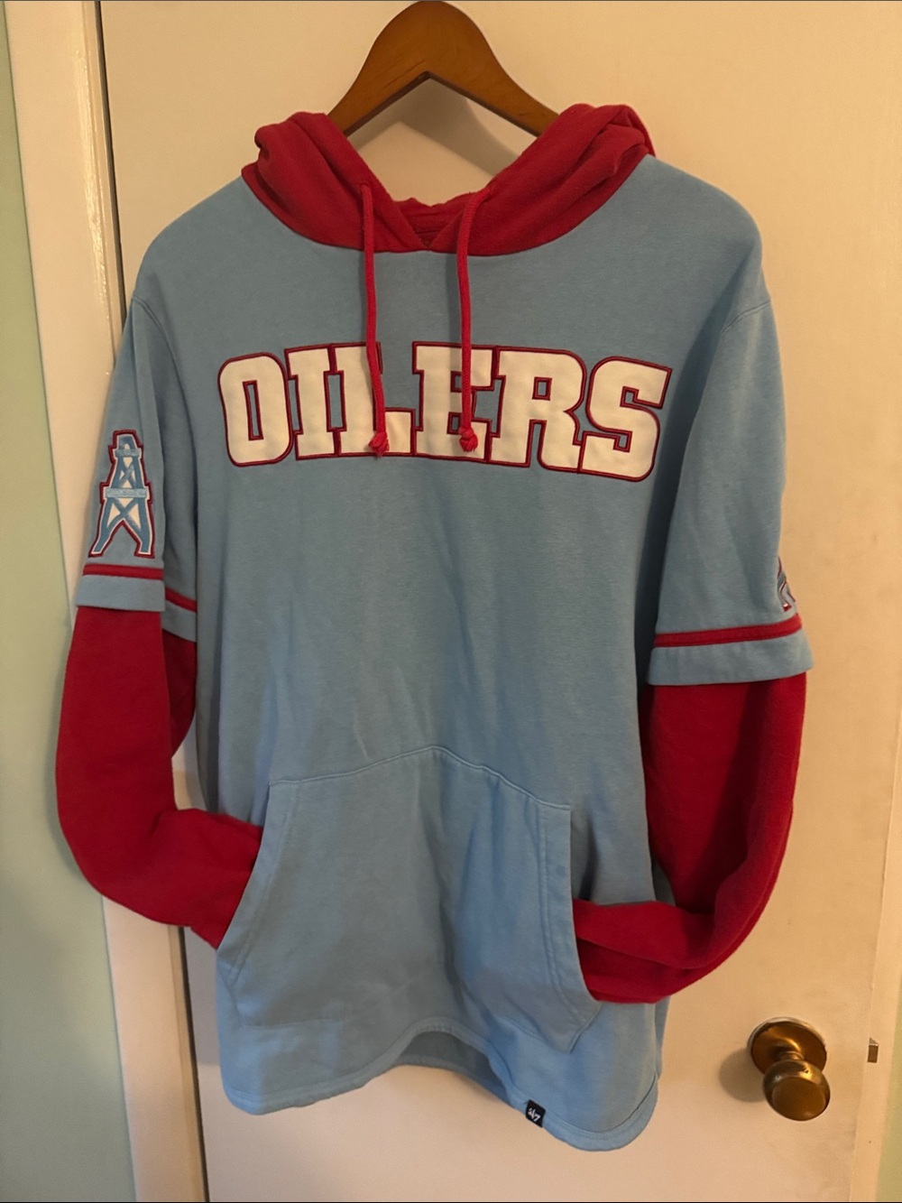 Houston Oilers Tennessee Titans Two-Tone Light Blue & Red Pullover Hoodie